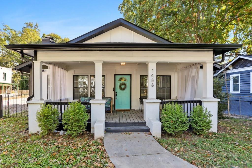 front view of a house with a small yard