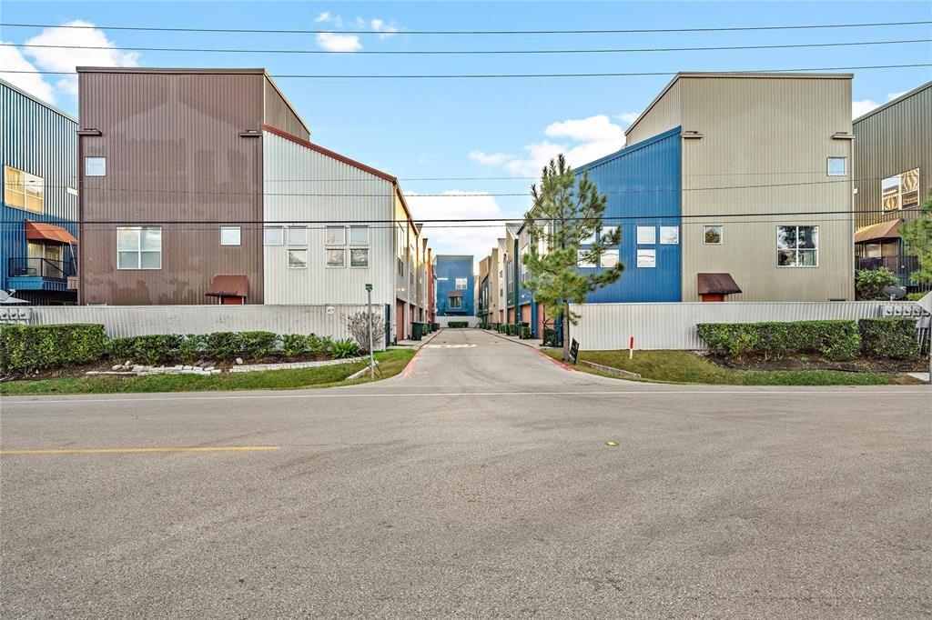 a view of a building with a street