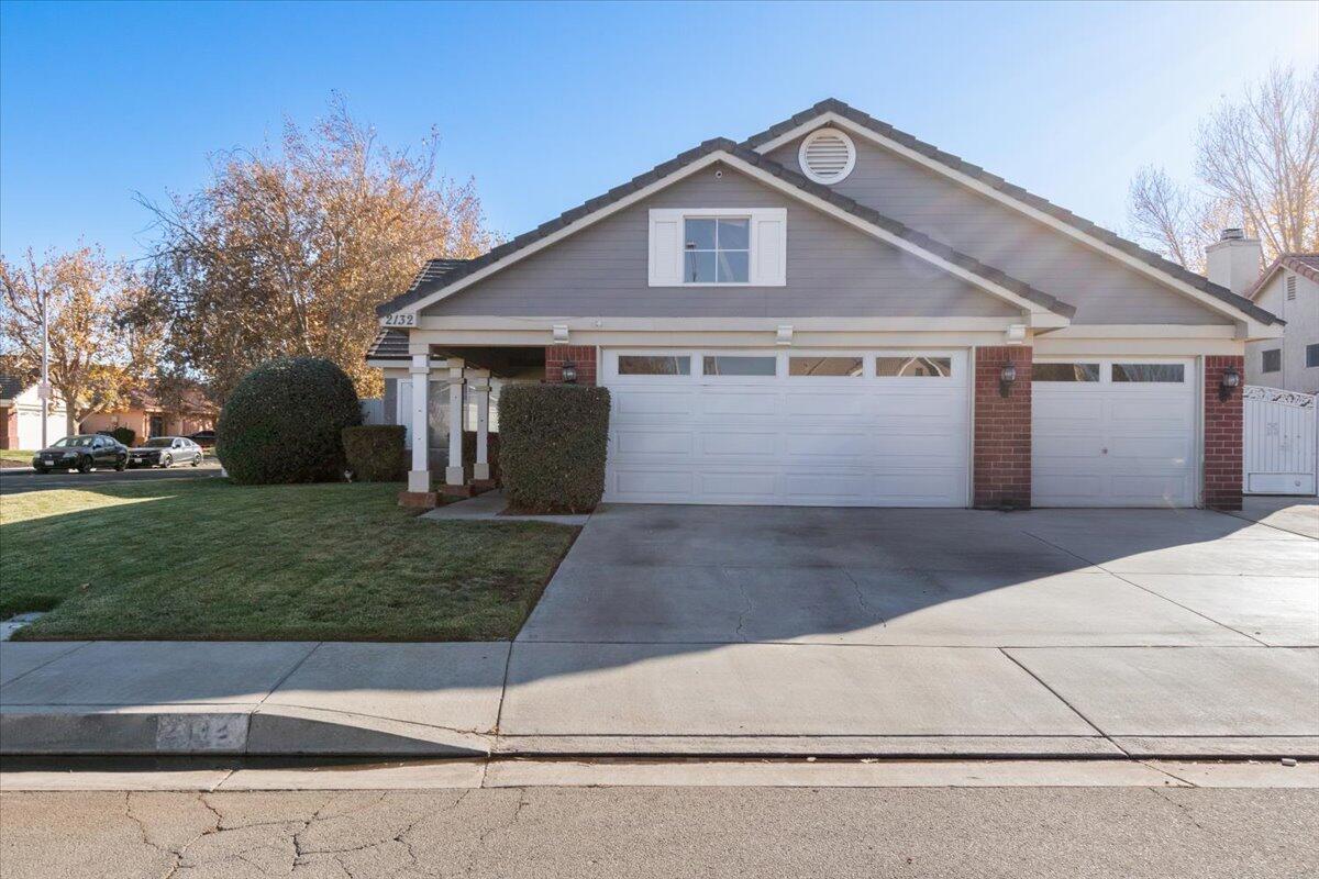 a front view of house with garage