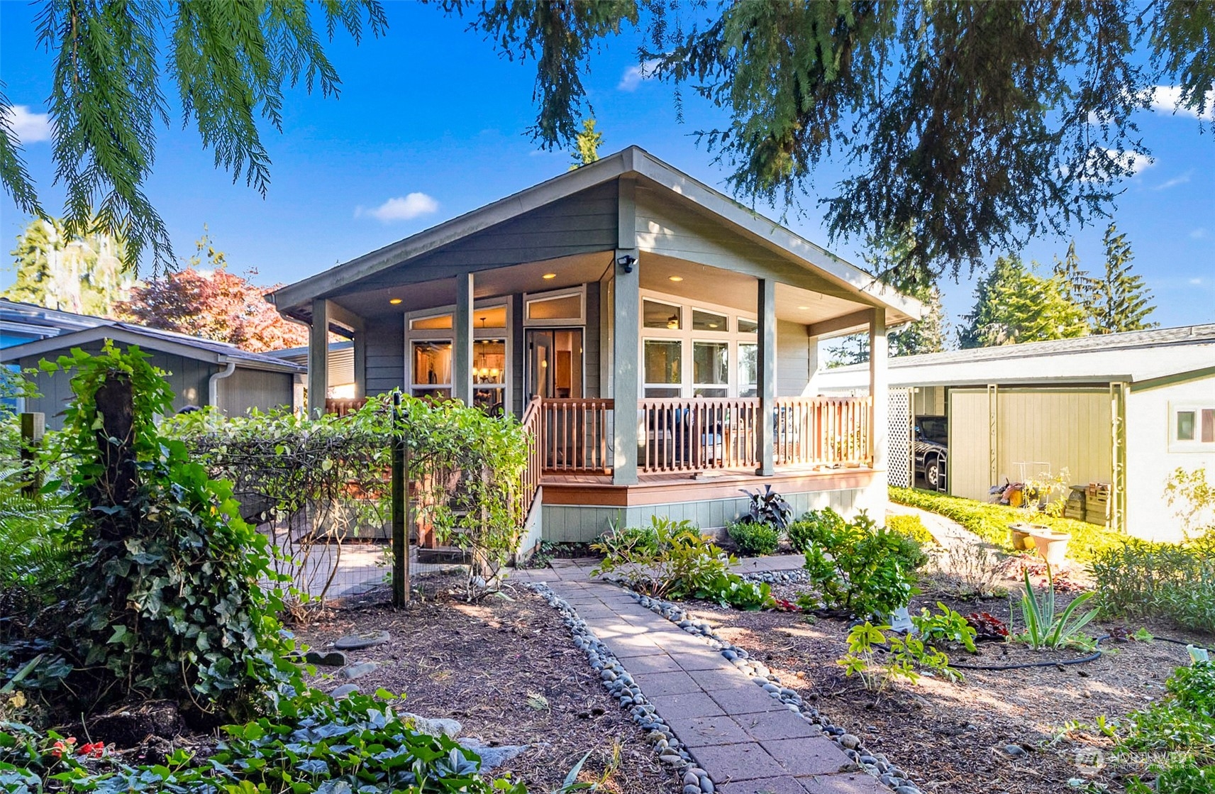 a front view of a house with garden