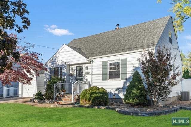 a view of a house with a backyard porch and sitting area