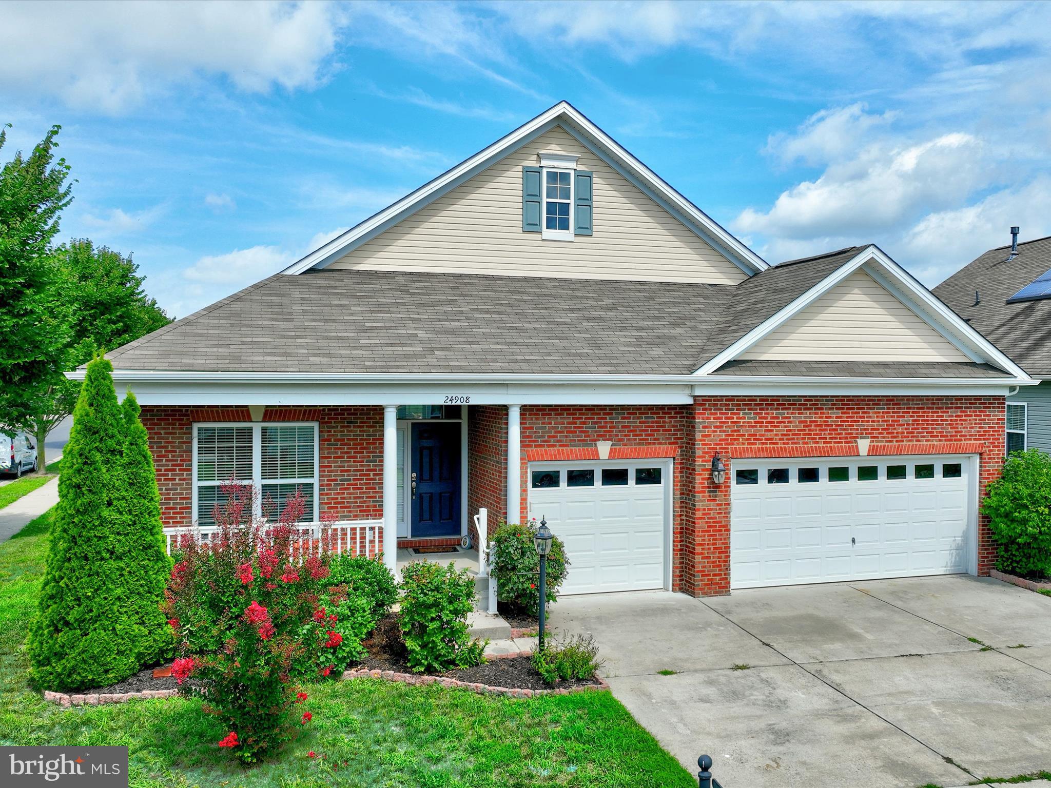 a view of front a house with a yard