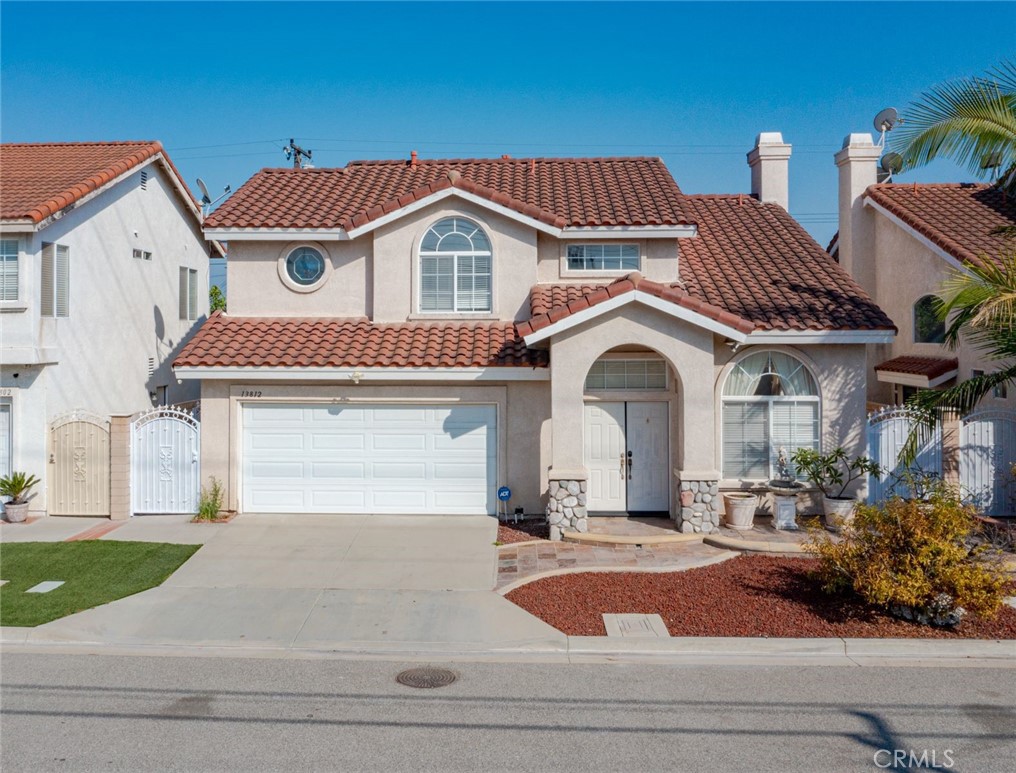 a front view of a house with yard