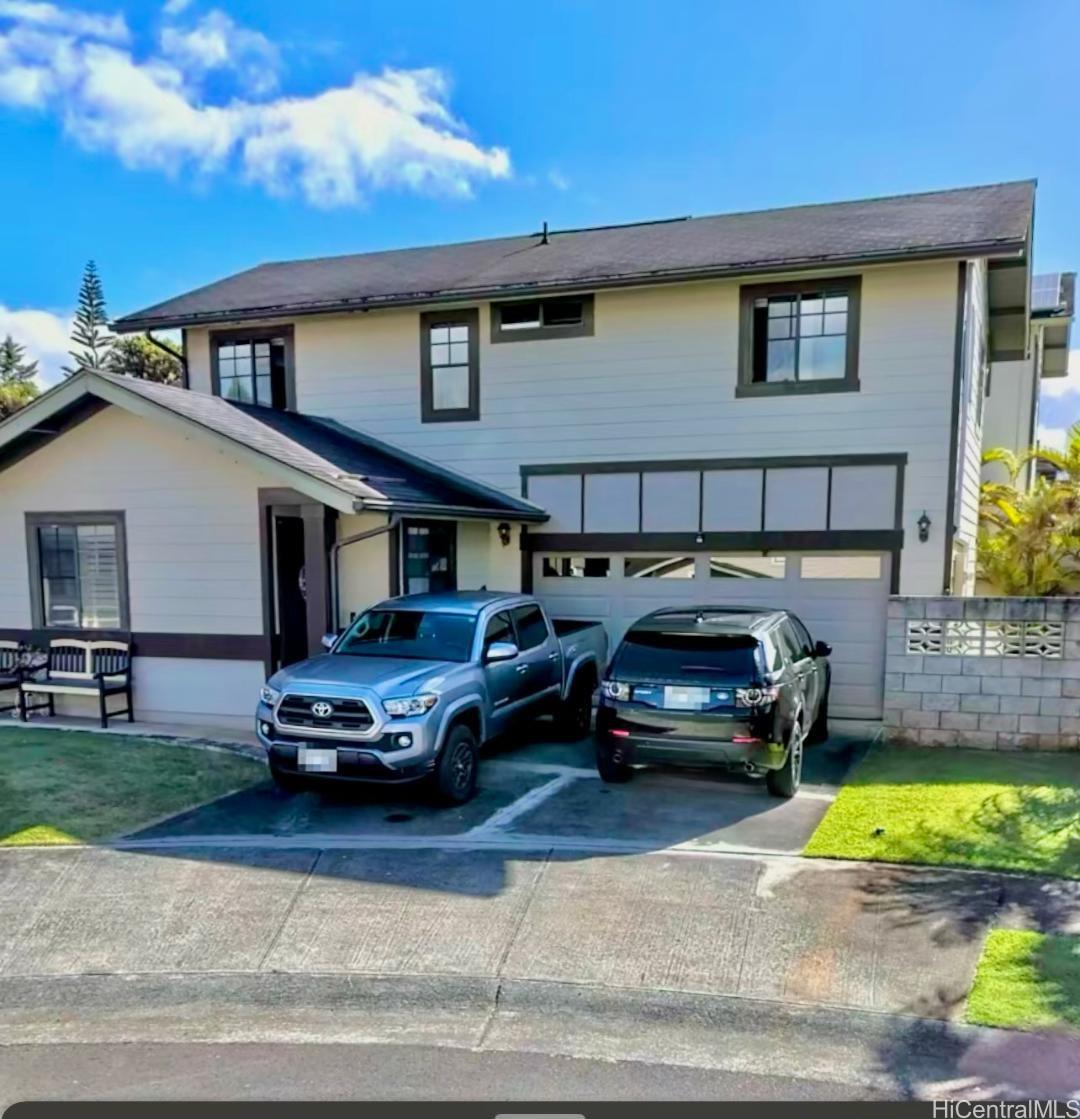 a car parked in front of a house