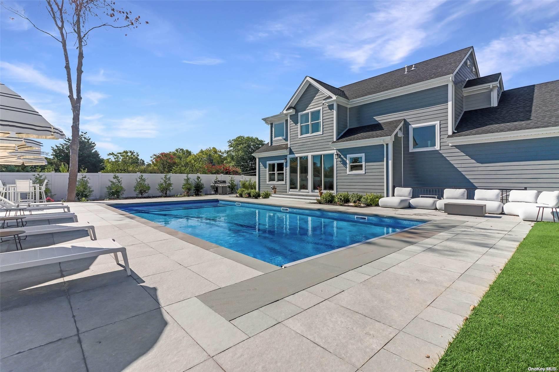 a view of a house with swimming pool