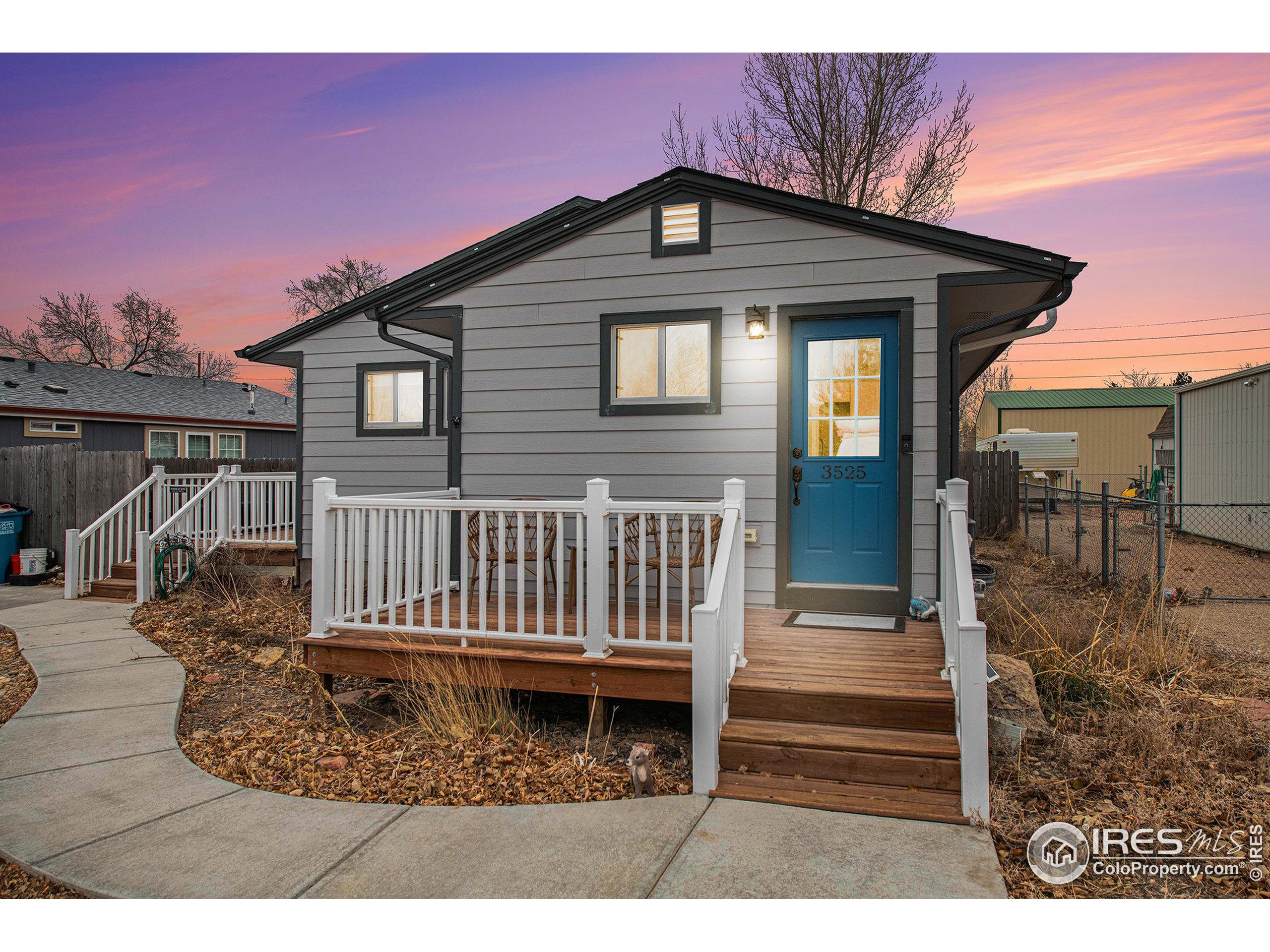 a front view of a house with a porch