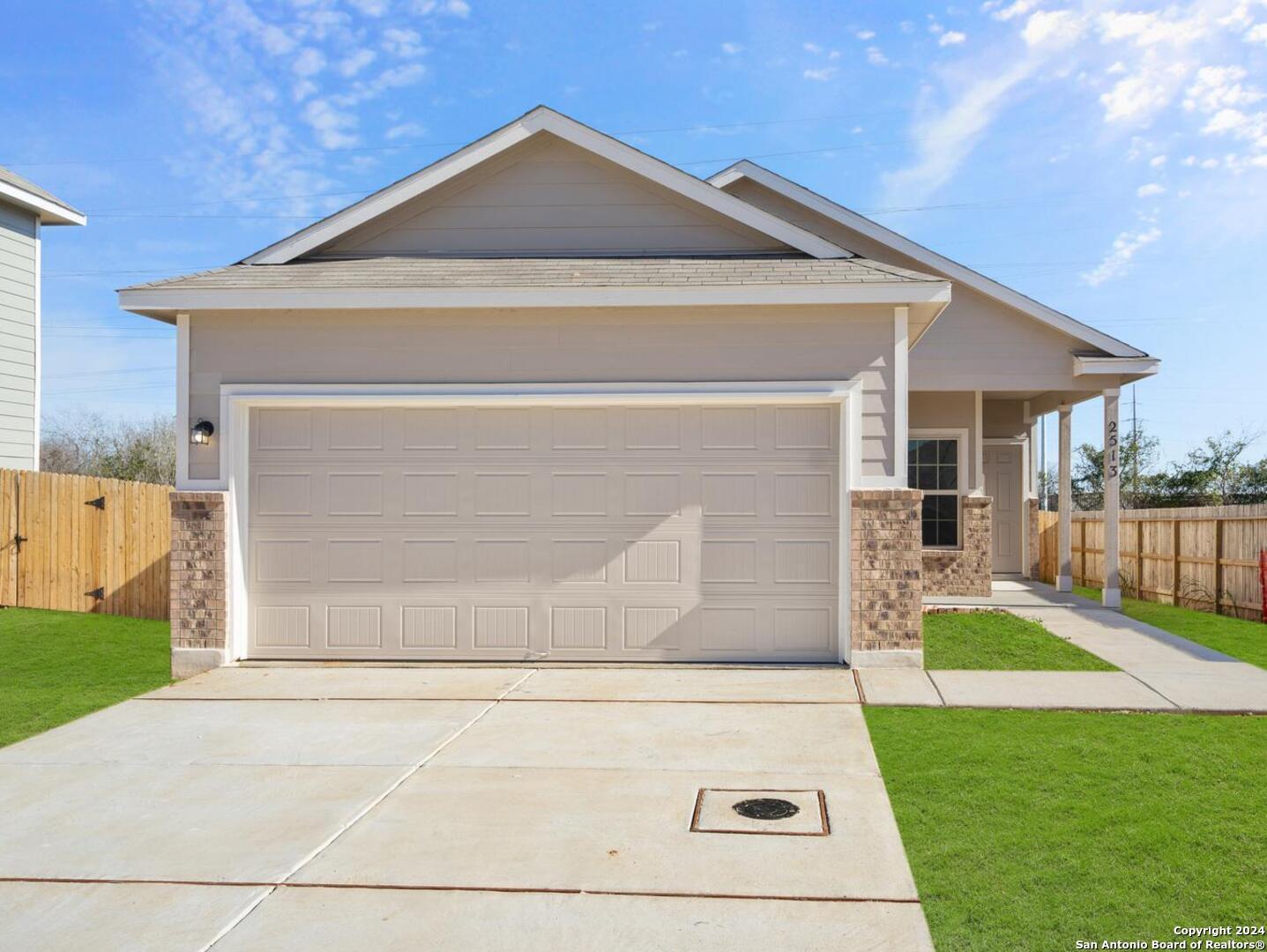 a front view of house with yard