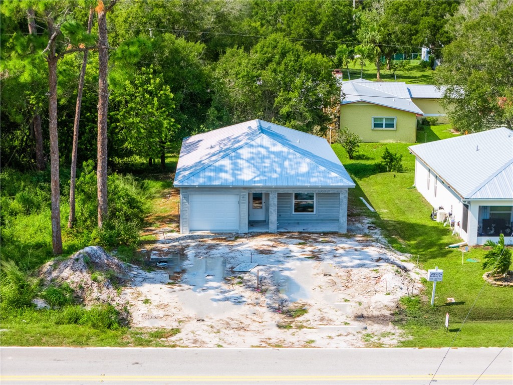 front view of a house with a yard