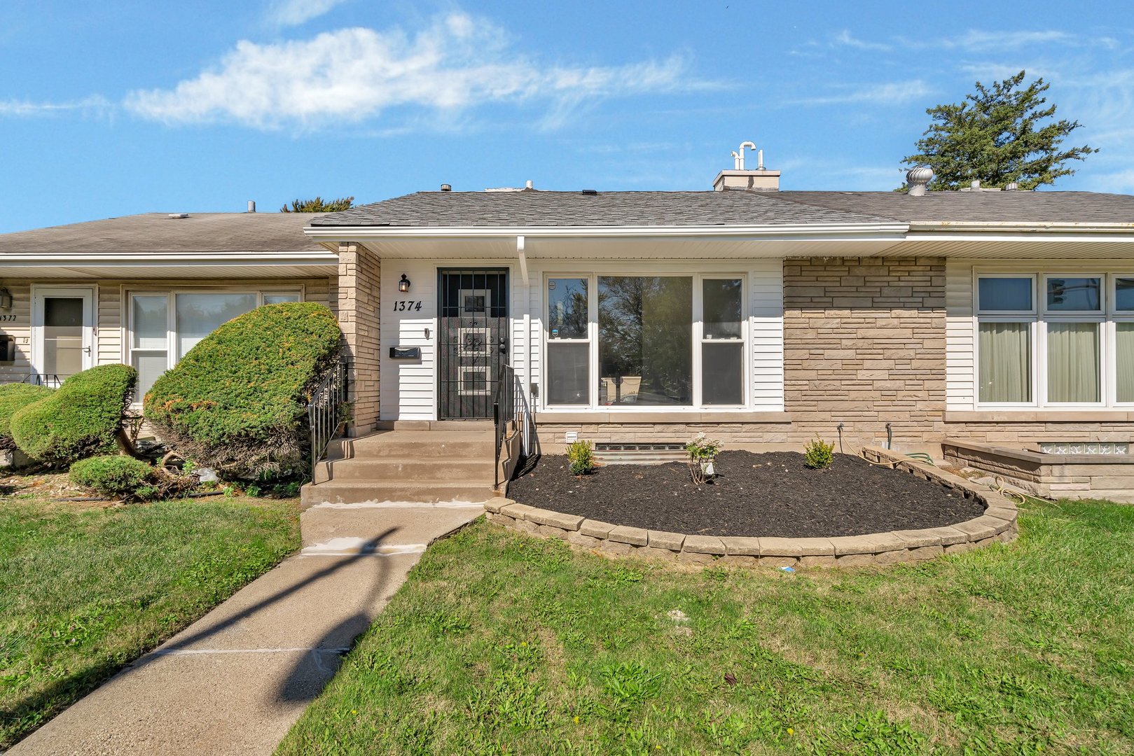 a front view of a house with entertaining space