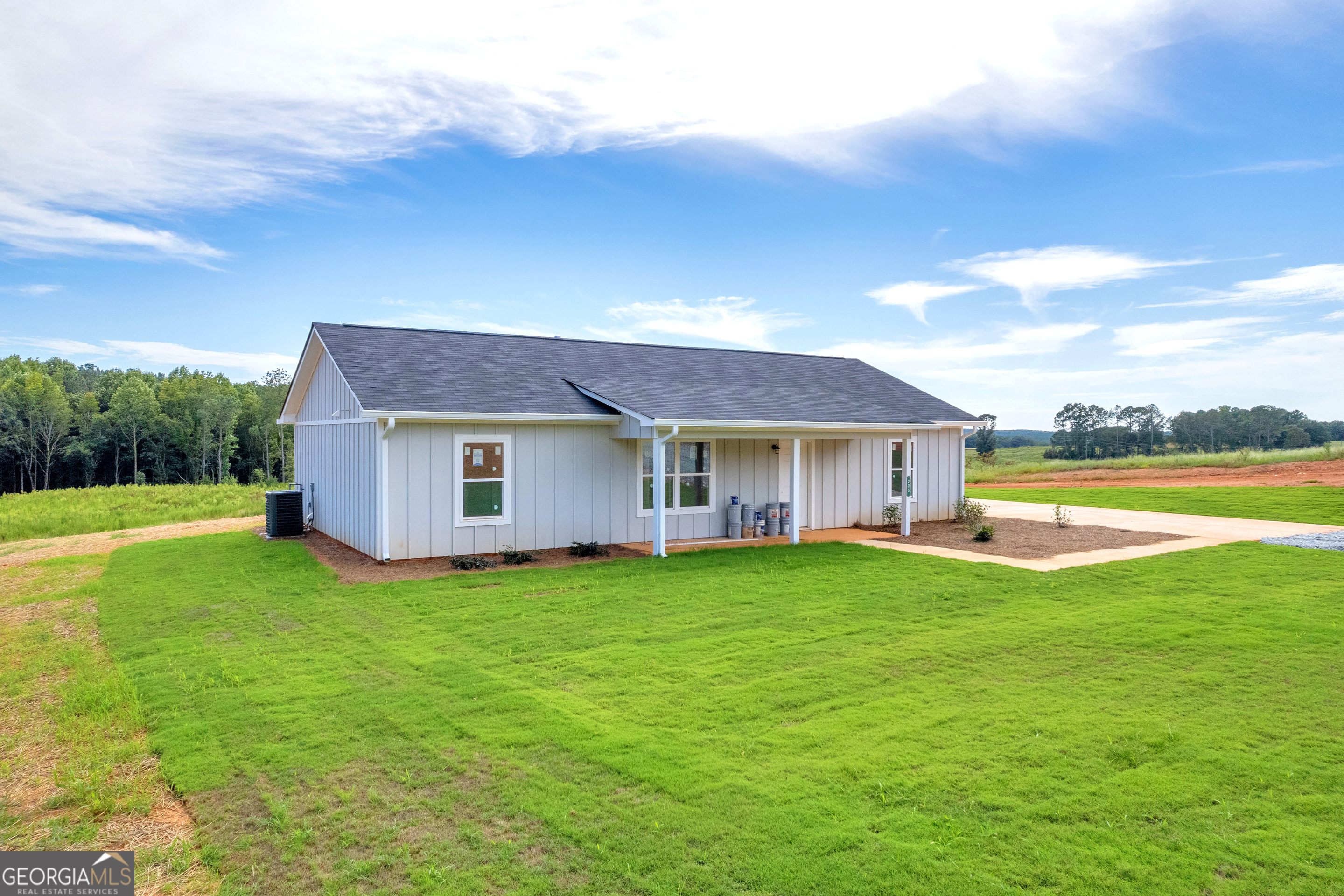 a view of a house with a big yard