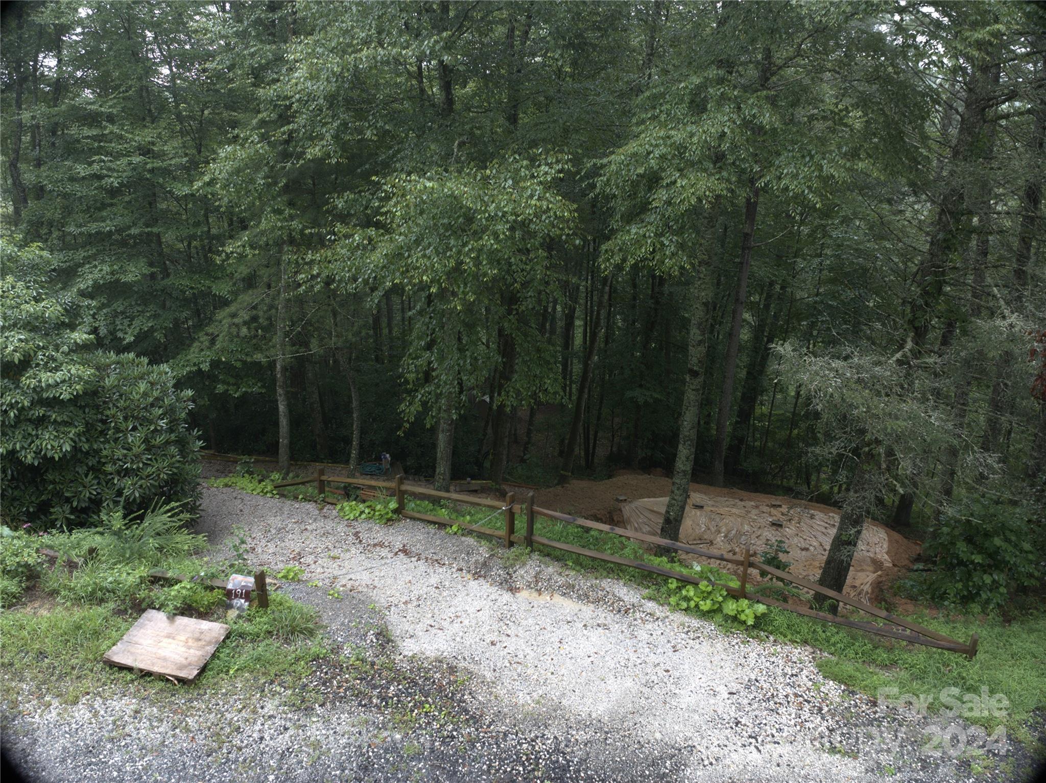 a view of outdoor space with lots of trees