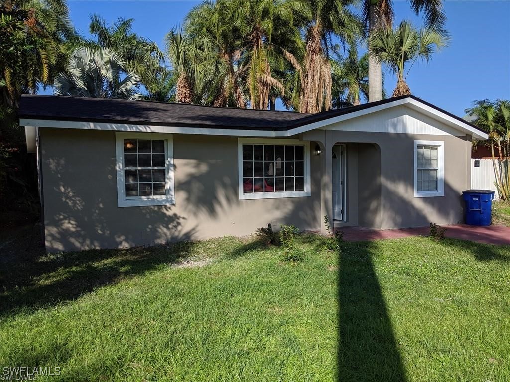 a front view of house with yard