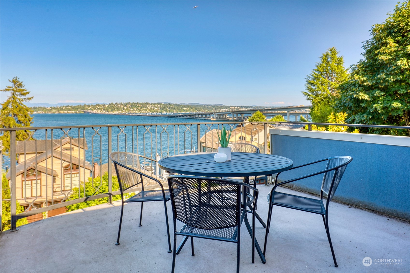 a view of a chairs and table on the terrace