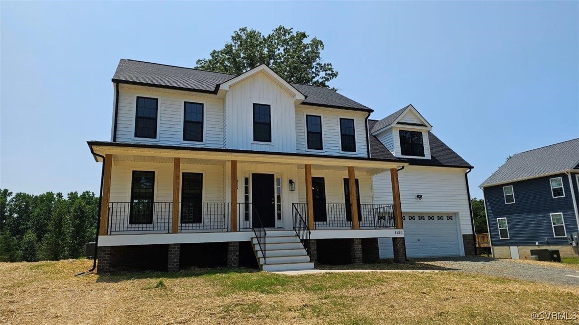 a front view of a house with glass windows