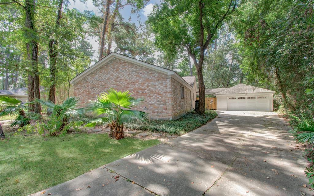 Front with large driveway