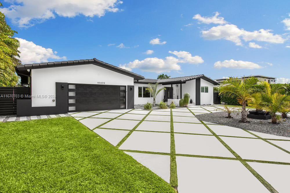 a house view with a garden space