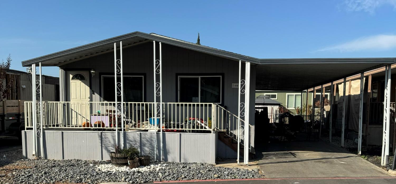 a view of a house with a balcony