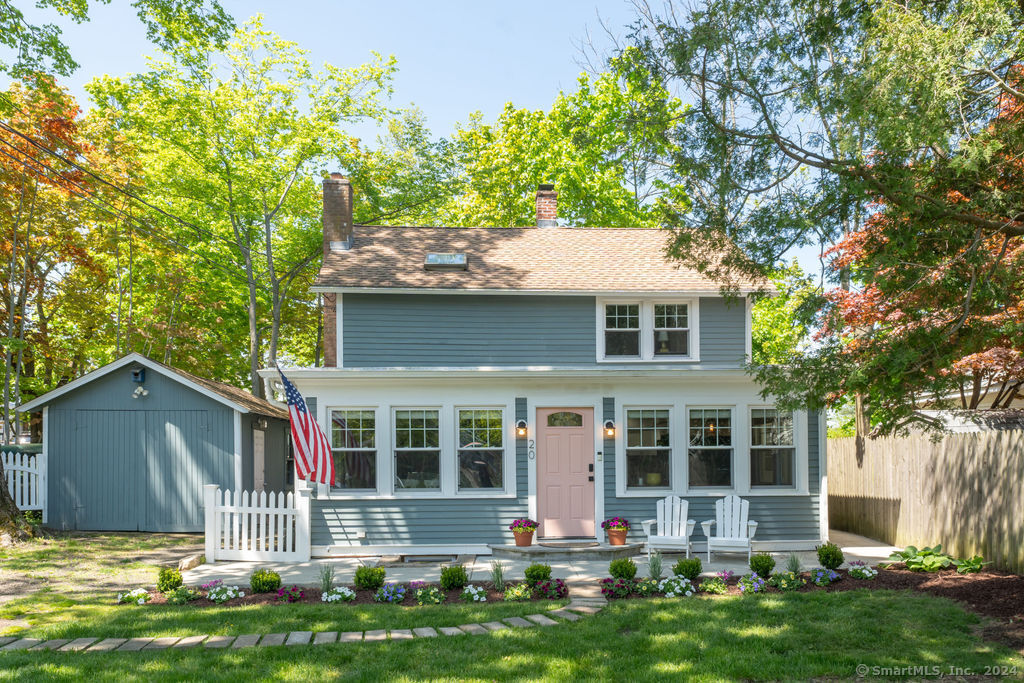 front view of a house with a yard