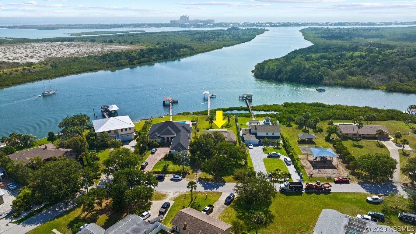 an aerial view of houses with outdoor space