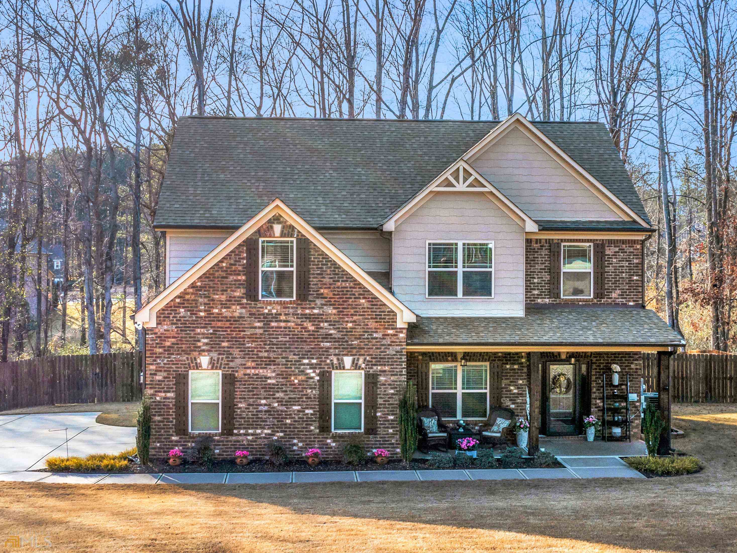 front view of a house with a yard