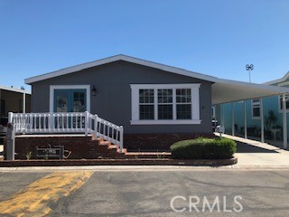 a front view of a house with yard