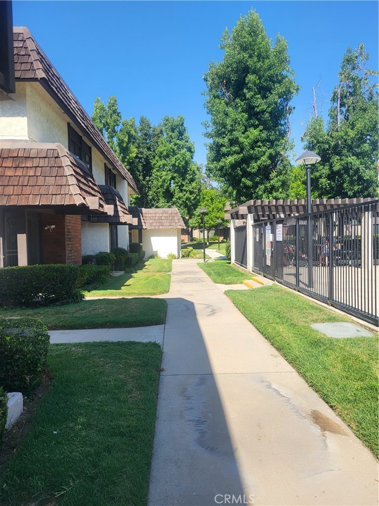 a house view with a garden space