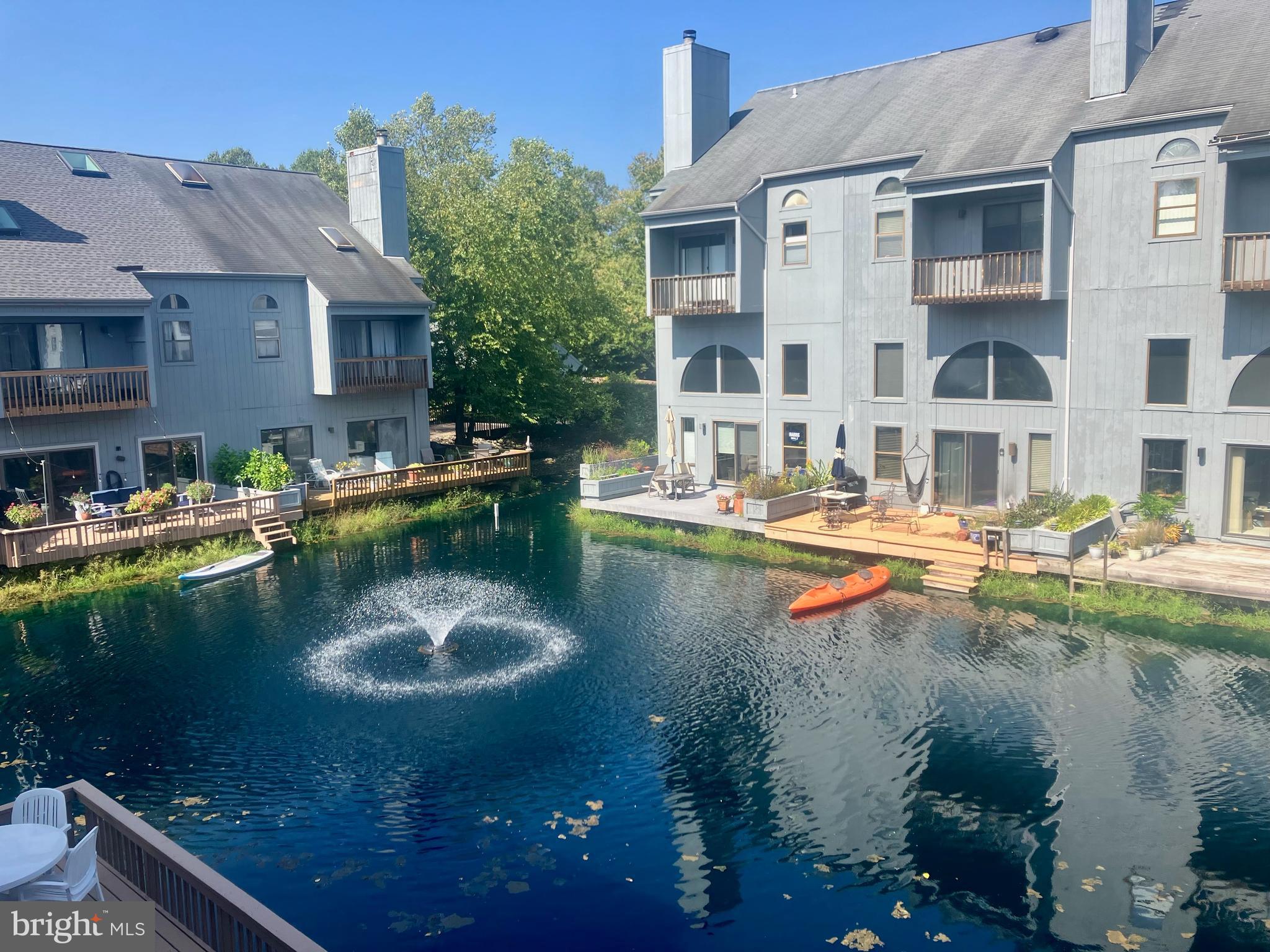 a view of pool with outdoor seating