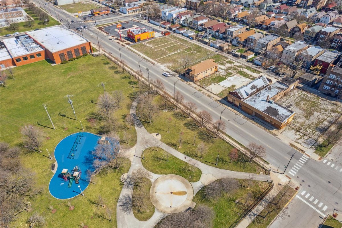 a aerial view of a house with a swimming pool