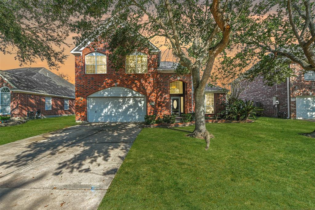 Admire the curb appeal of this fully bricked home with its classic design