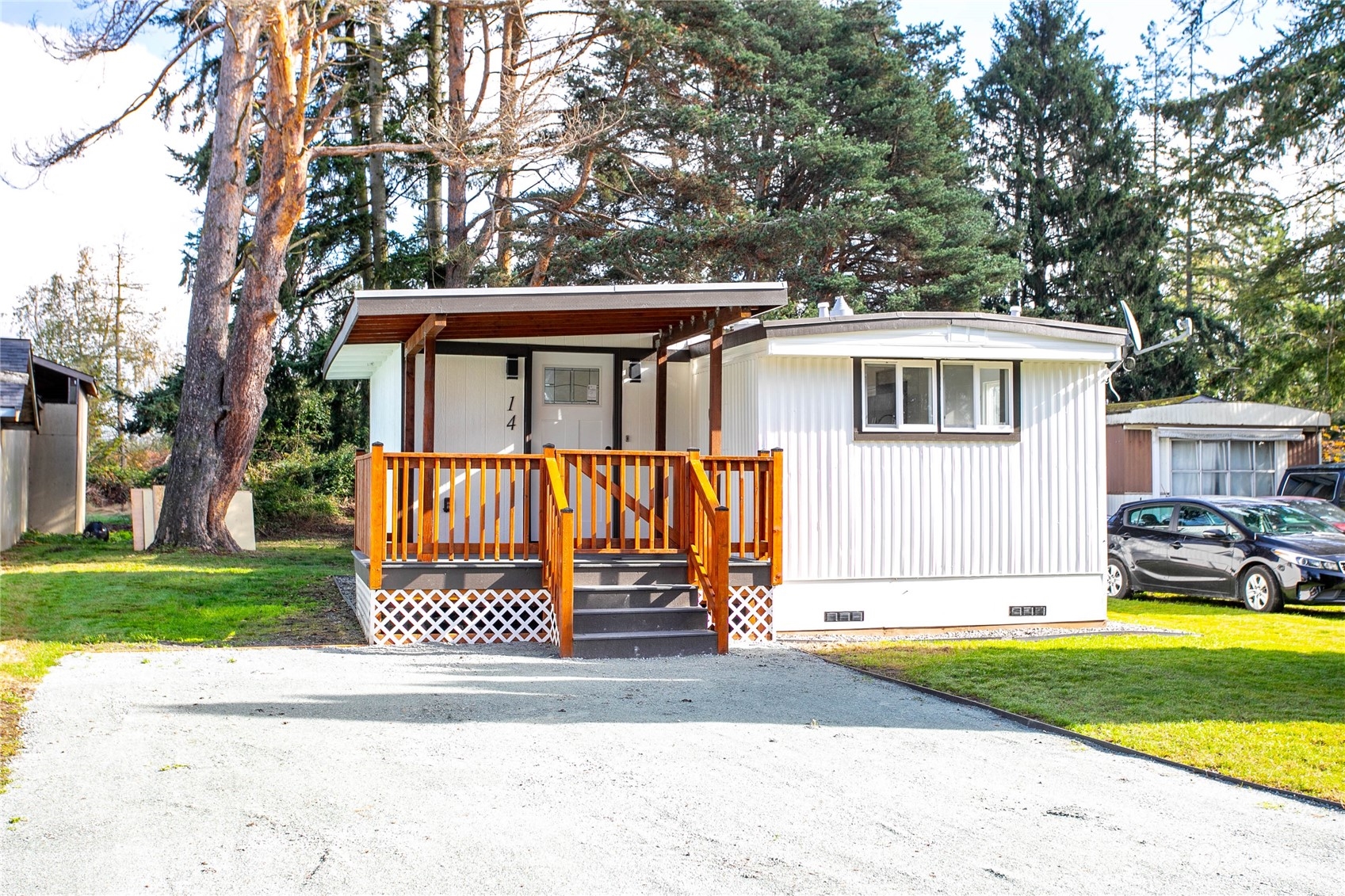 front view of a house with a yard