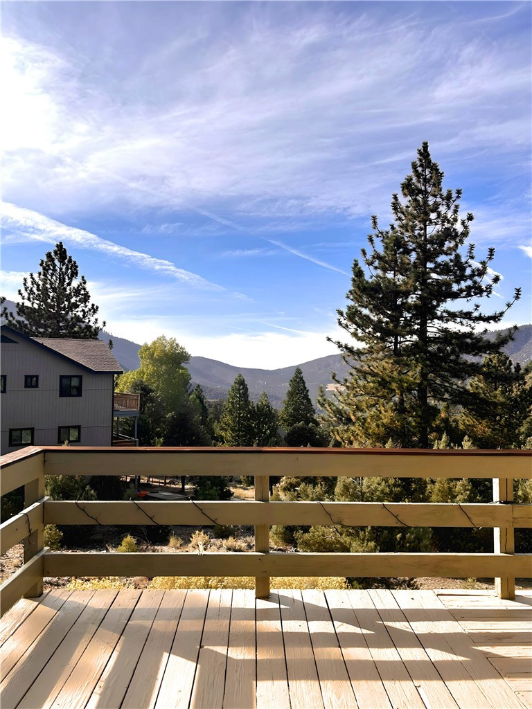 a view of a yard with an outdoor seating