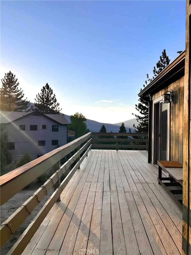 a view of balcony with furniture