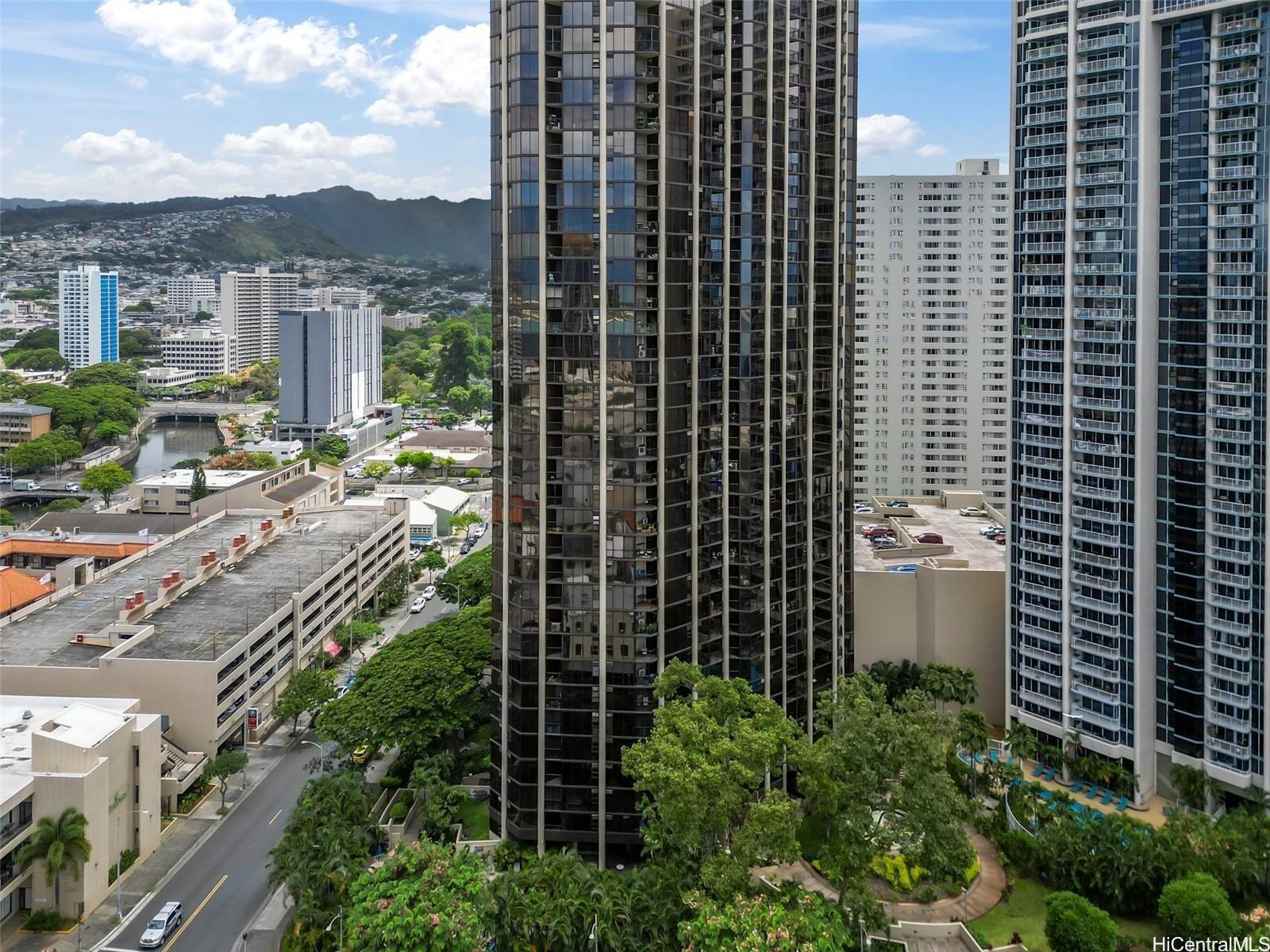 a view of a city with tall buildings