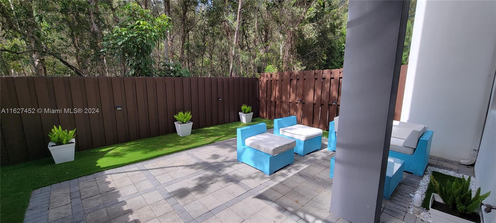 a garden view with a seating space