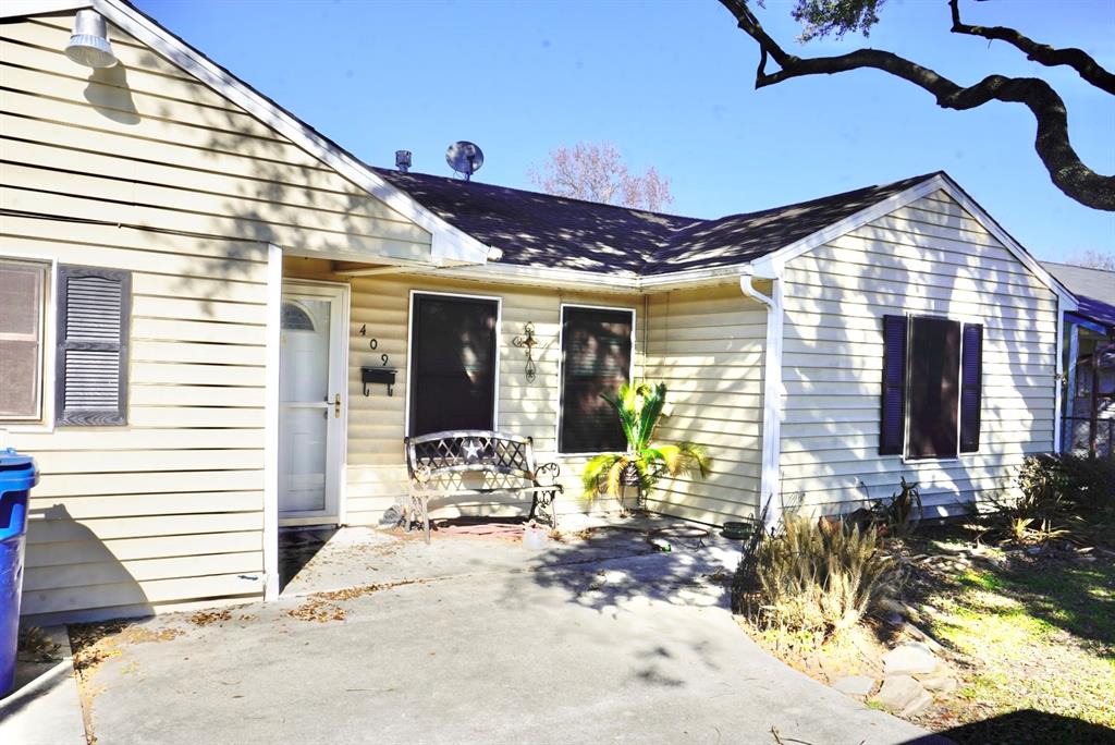 a front view of a house with patio