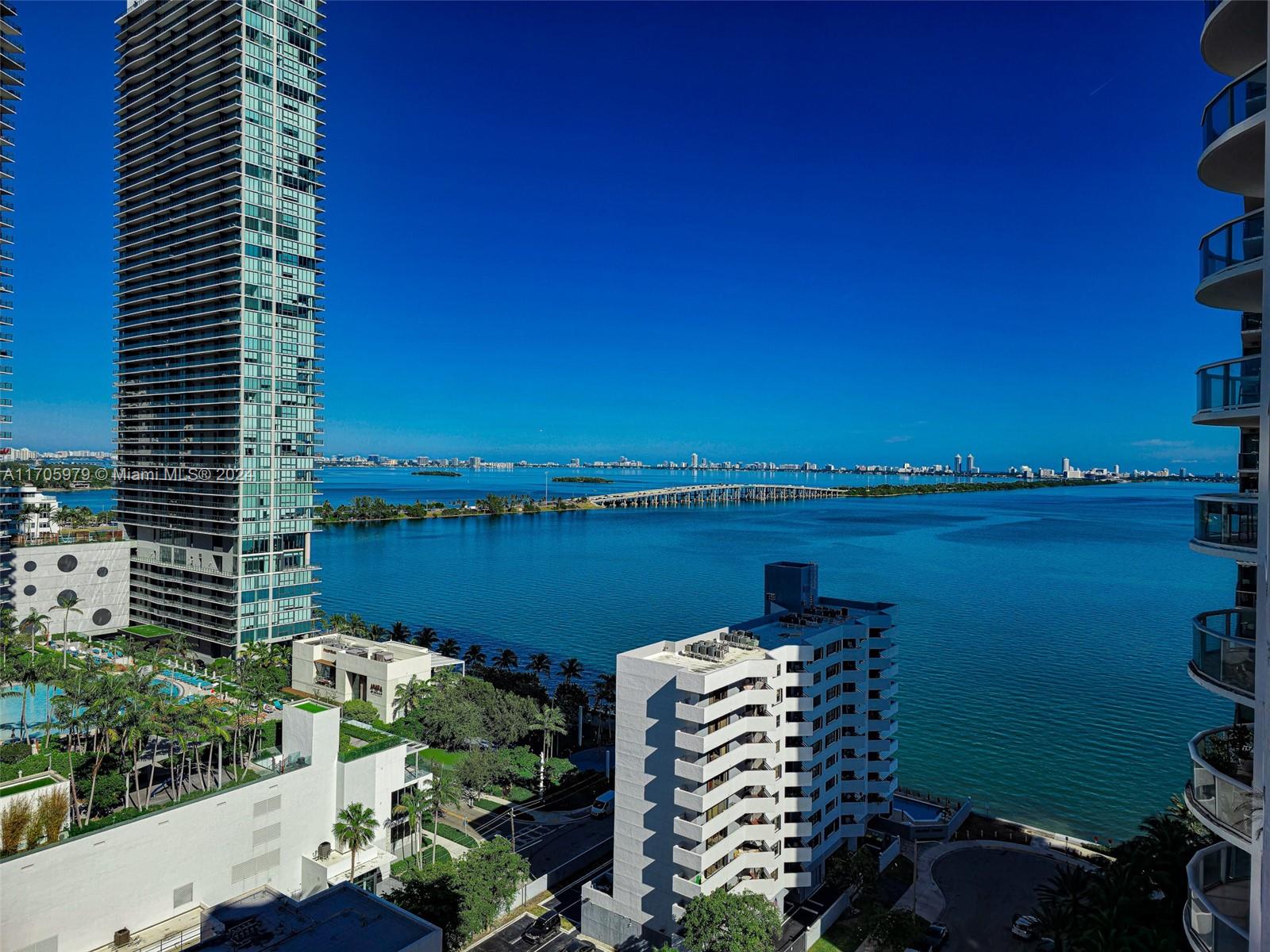 a view of a lake with a city view