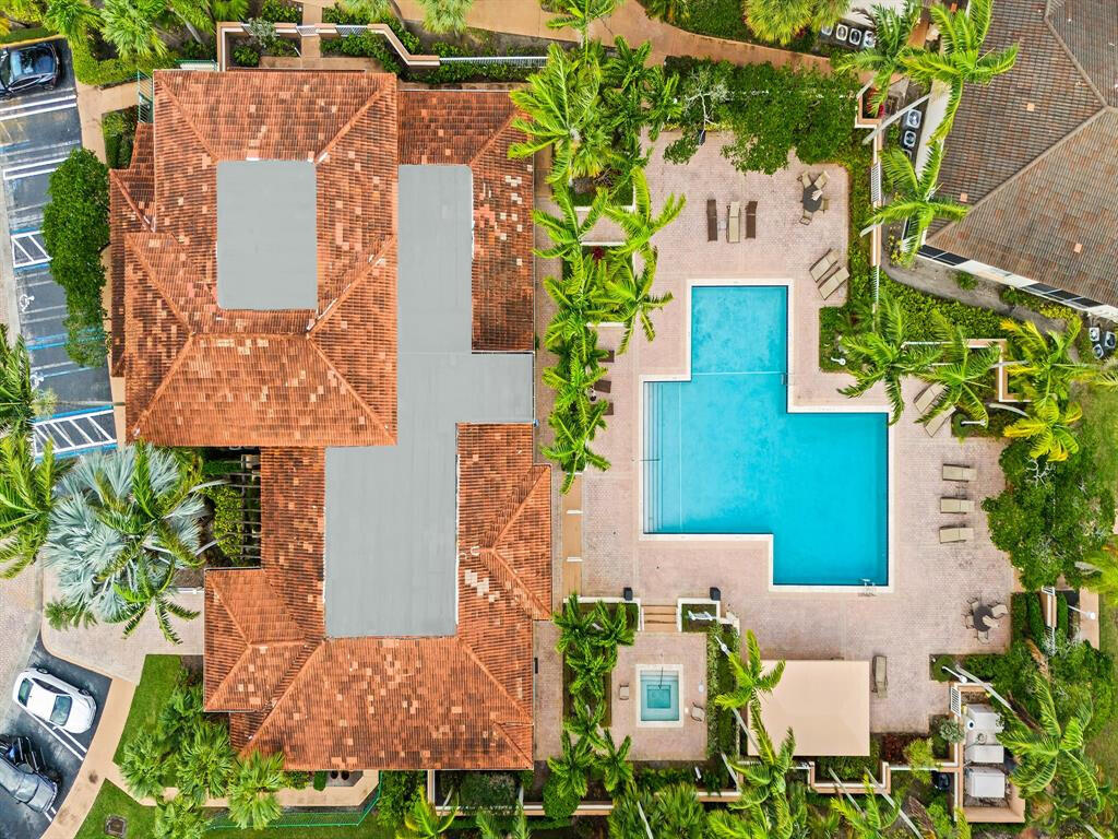 an aerial view of a house with outdoor space