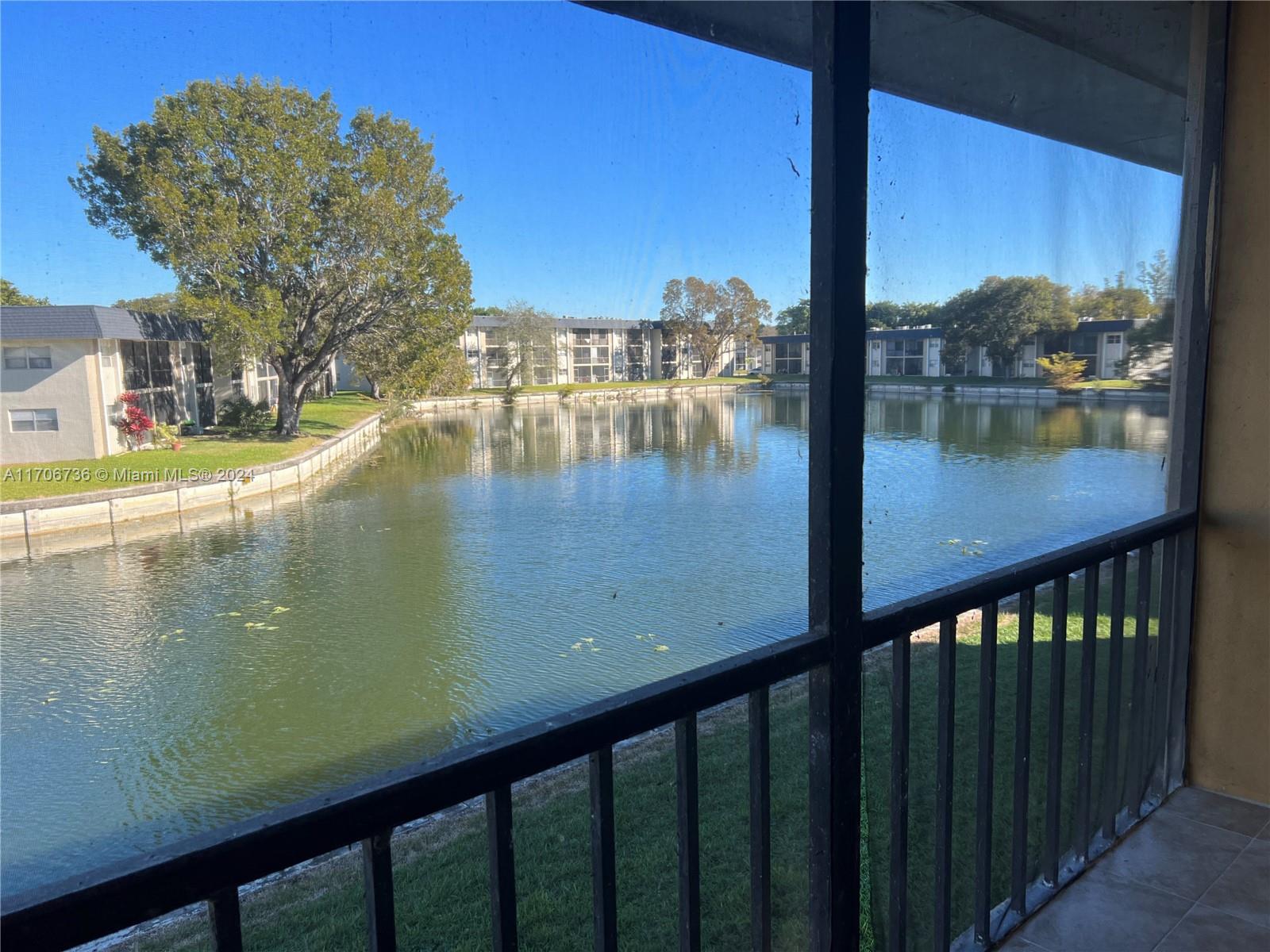 a view of a lake from a balcony