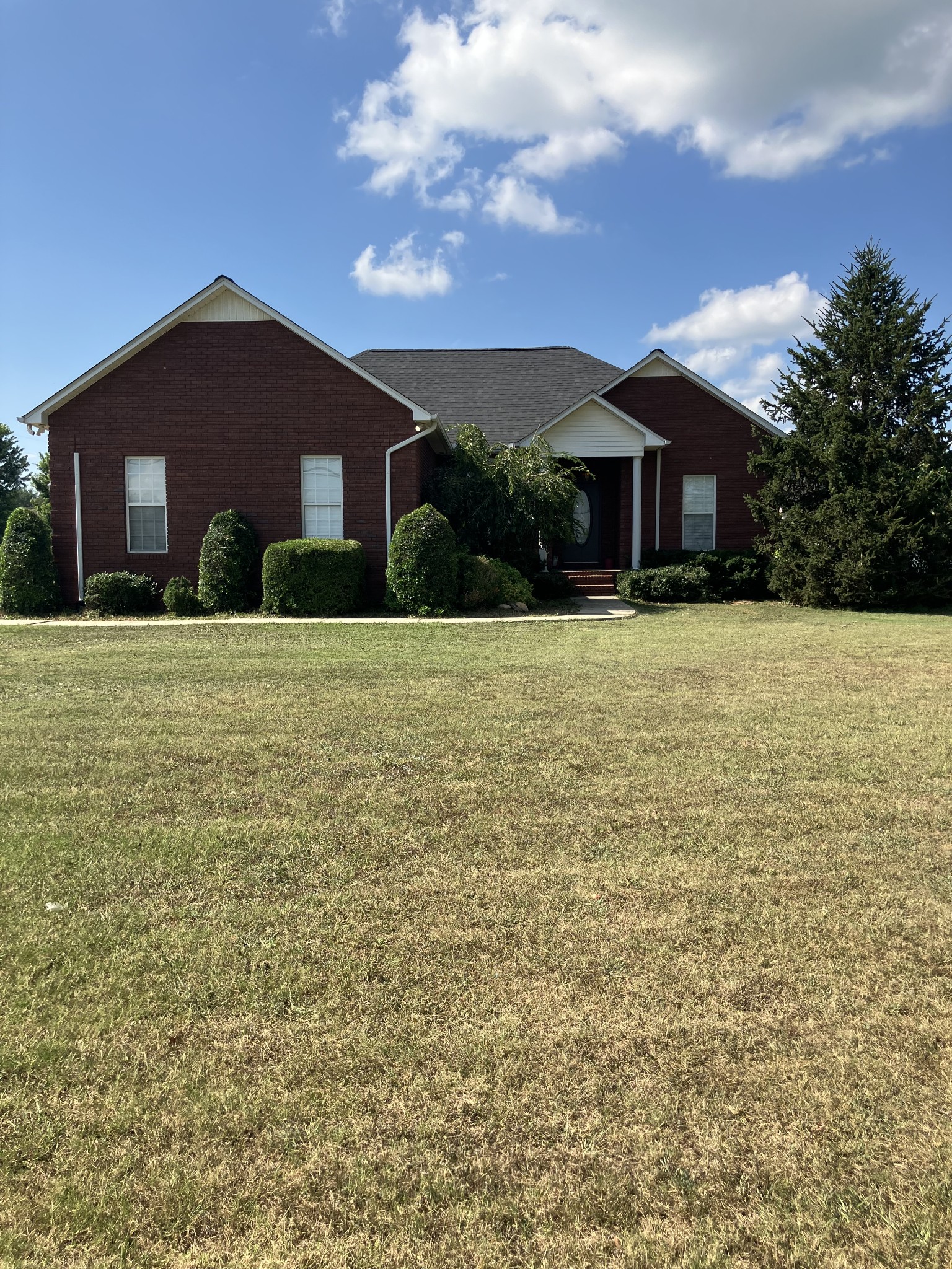 a front view of house with yard