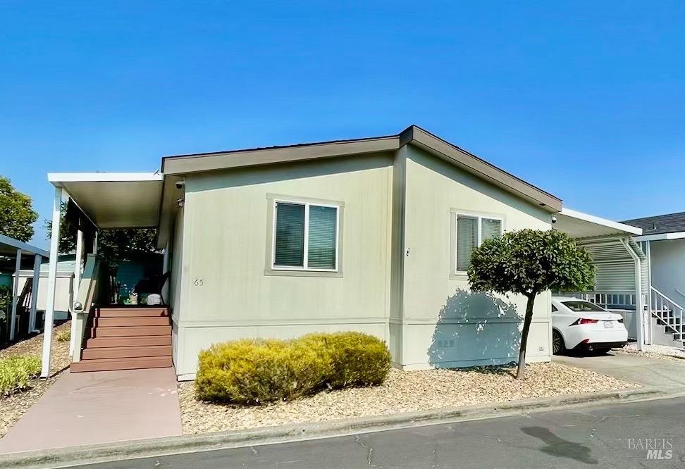 a view of a house with a patio