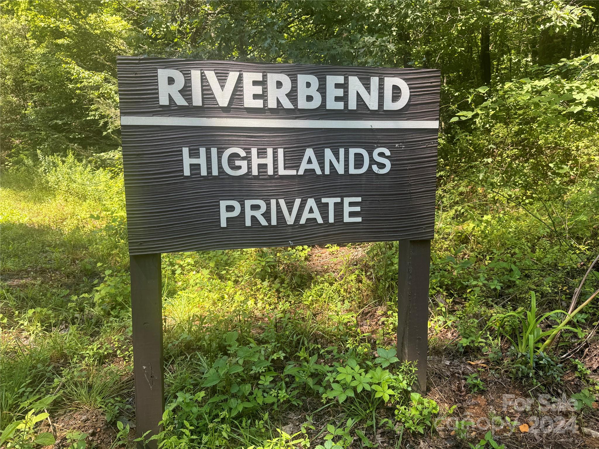 a sign broad in front of a building