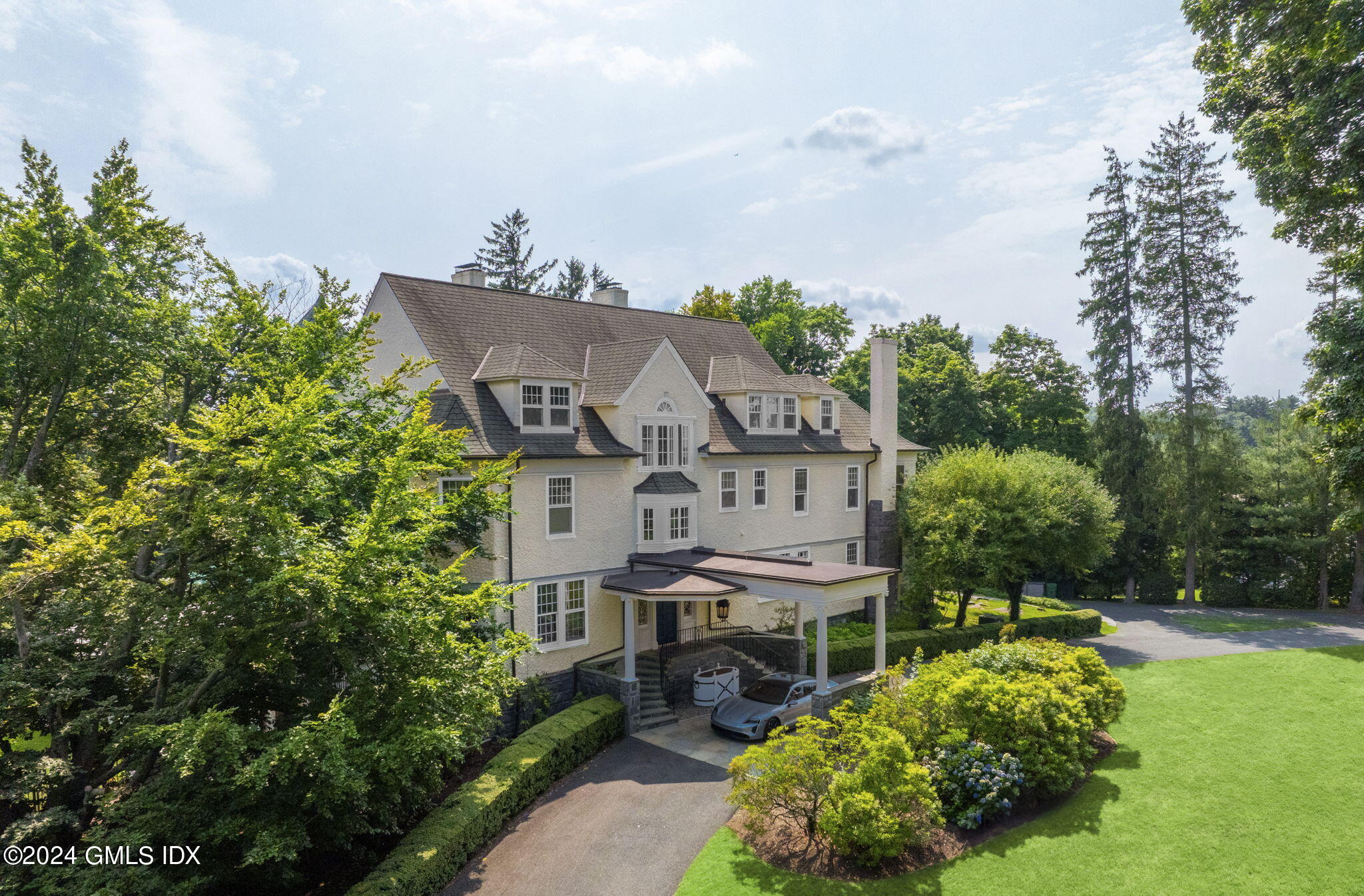 a aerial view of a house with garden