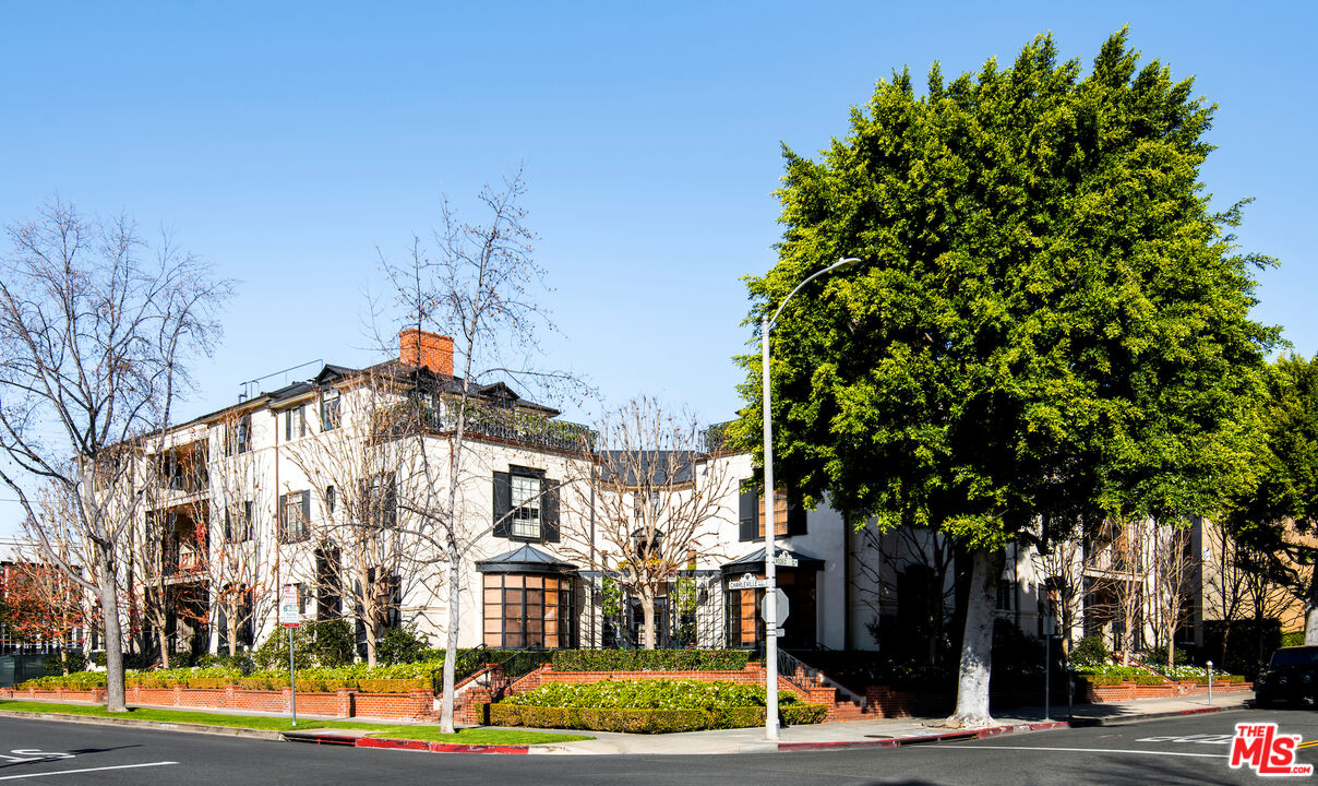 a front view of a building with street view