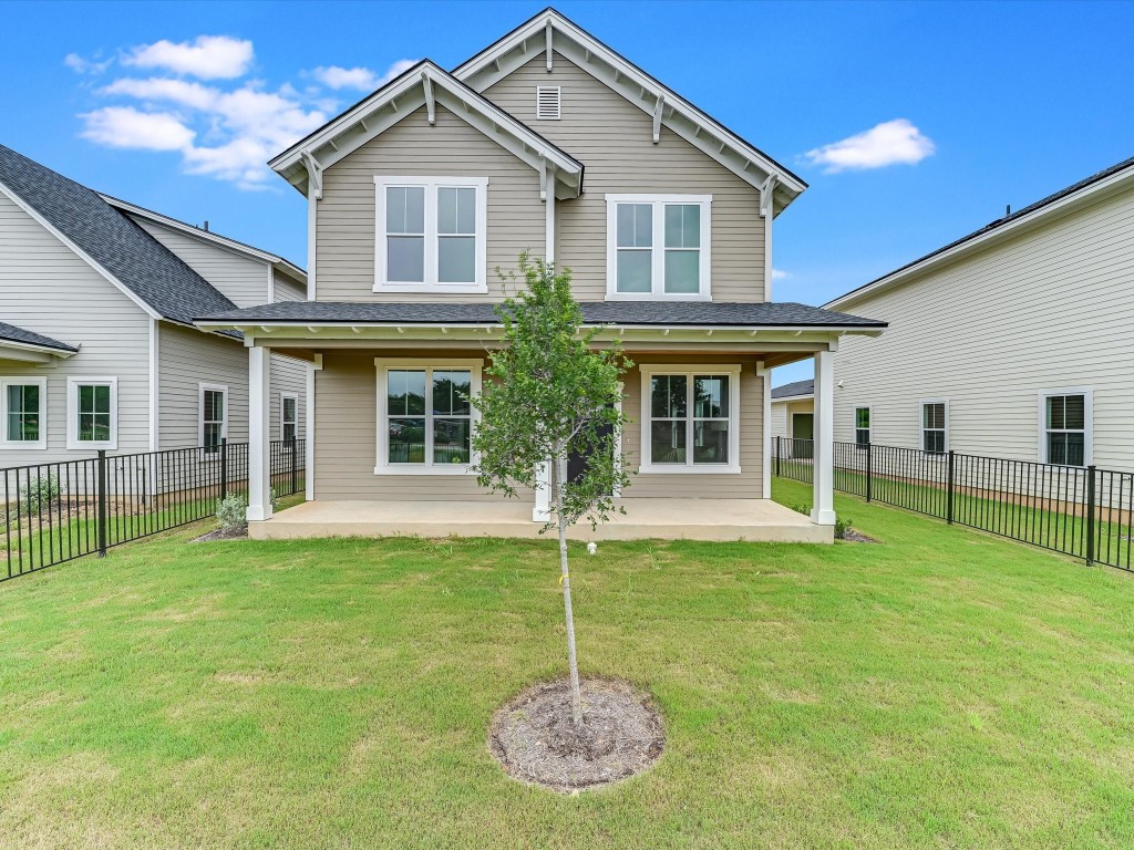 a house with garden in front of it