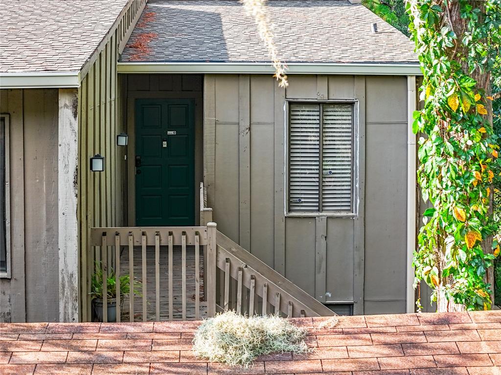 a view of a house with a small garden