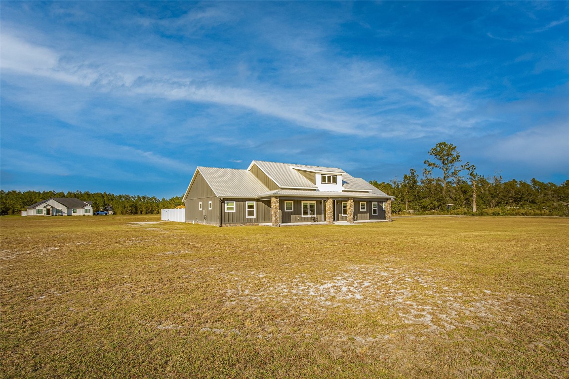 a front view of a house with a ocean view