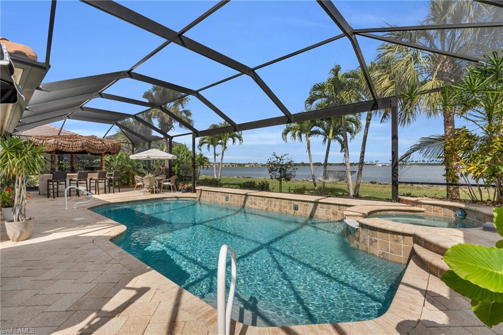 a view of a swimming pool with a patio