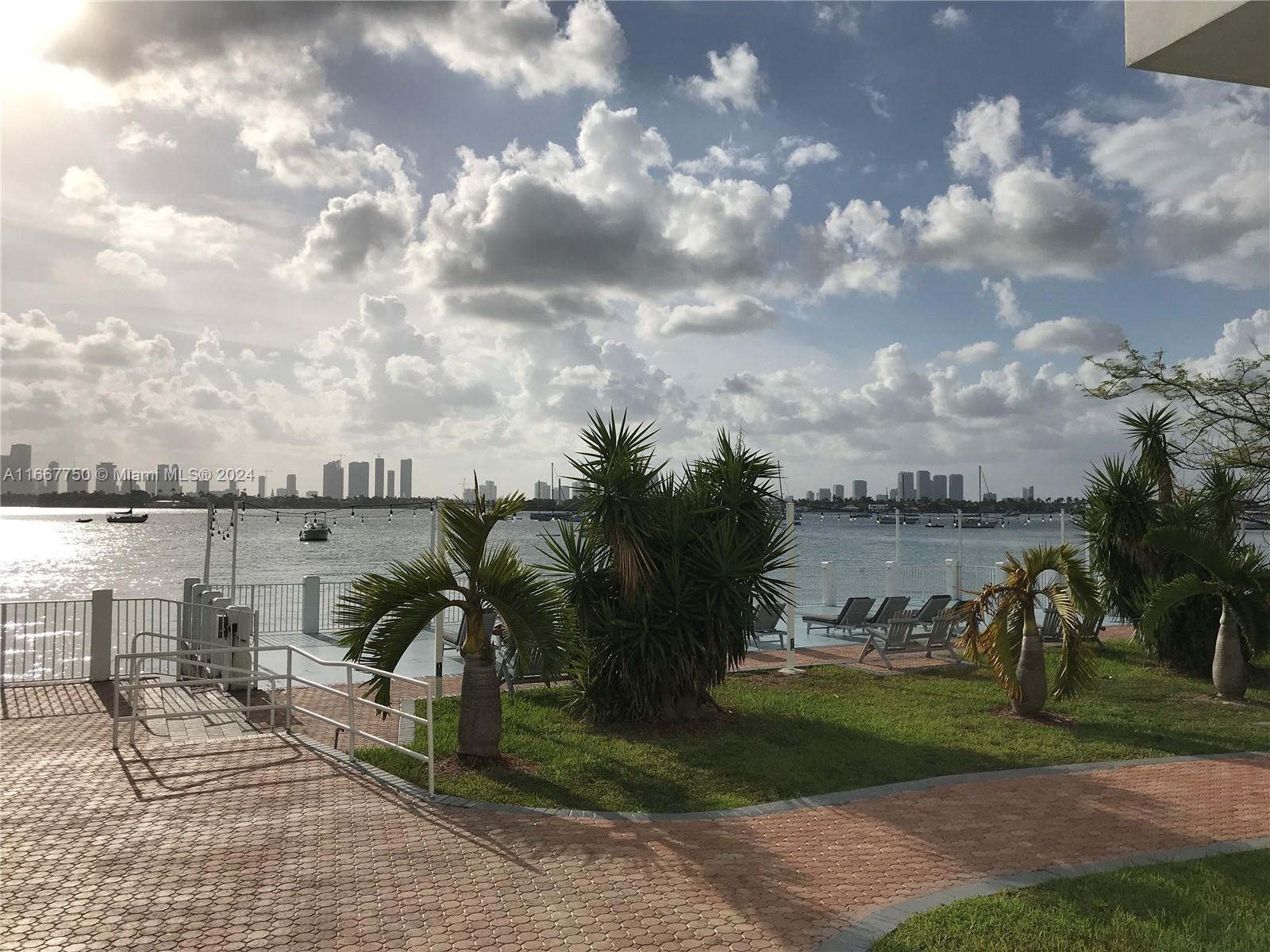 a view of a lake and a yard