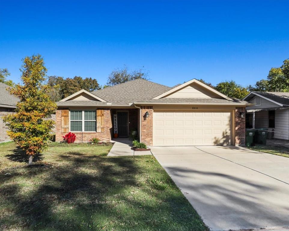 a front view of a house with yard