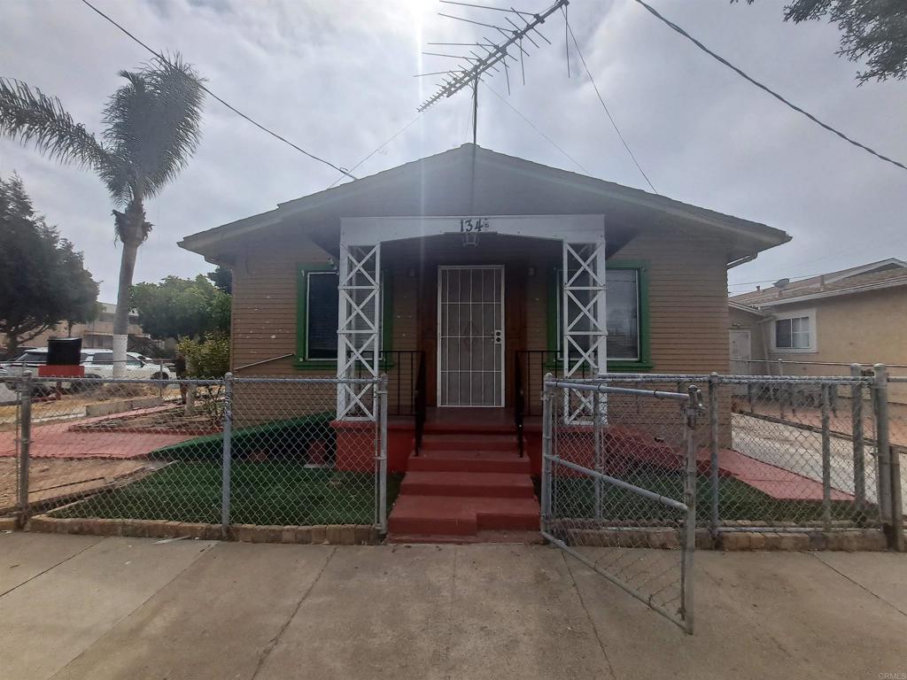 a view of a house with a street